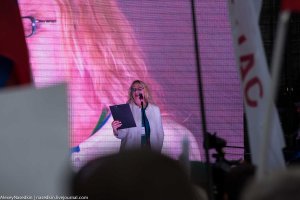 Leading the activities on stage, Oksana Mysina